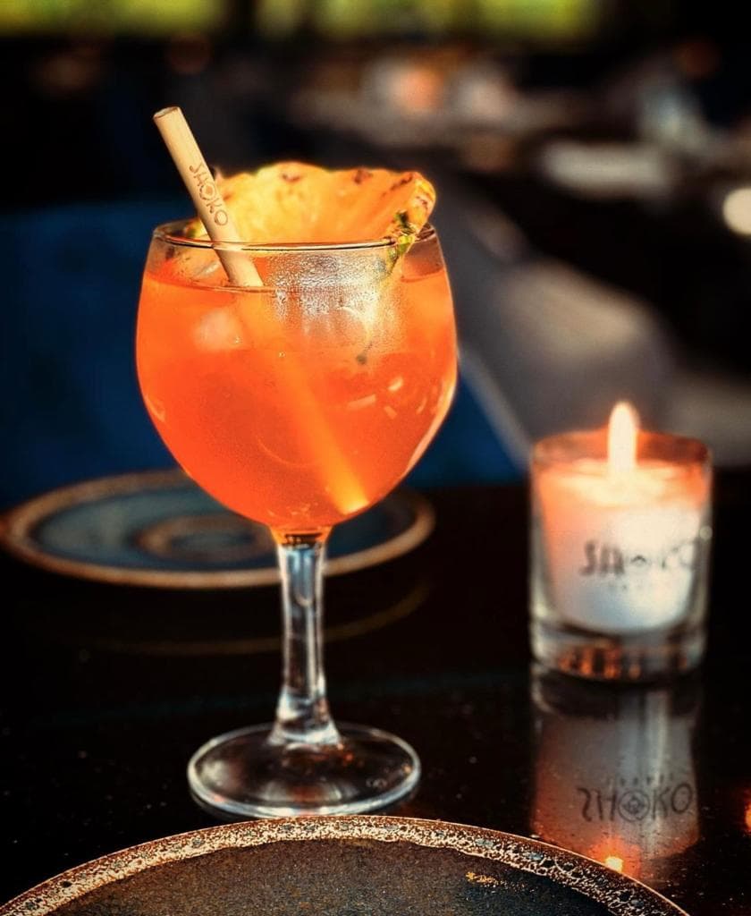 Spritz à la lueur d'une bougie, paille en roseau